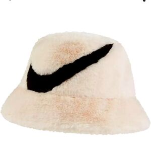 Nike Swoosh faux fur bucket hat in off white